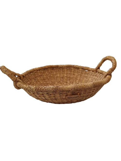 handwoven bowl made of elephant grass with two handles, used for serving bread or storing fruits