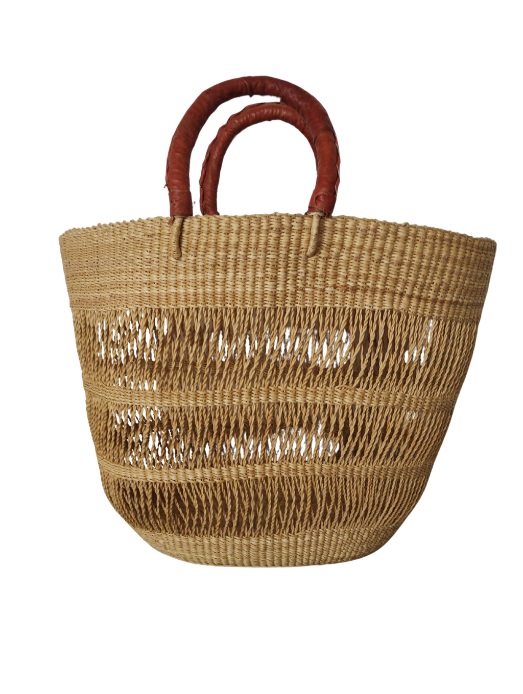 A brown natural basket with a sturdy handle, made from elephant grass for the beach 