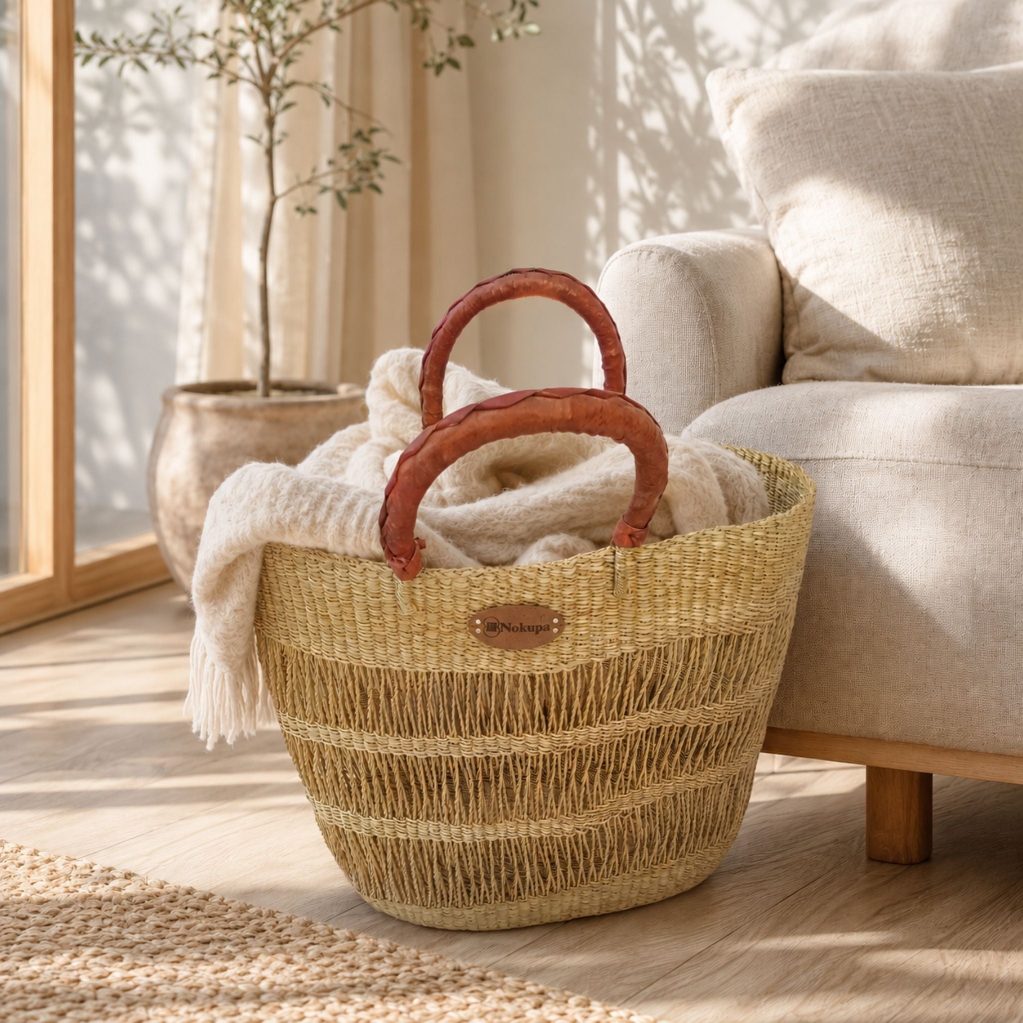 Nokupa handwoven natural market basket for blanket storage