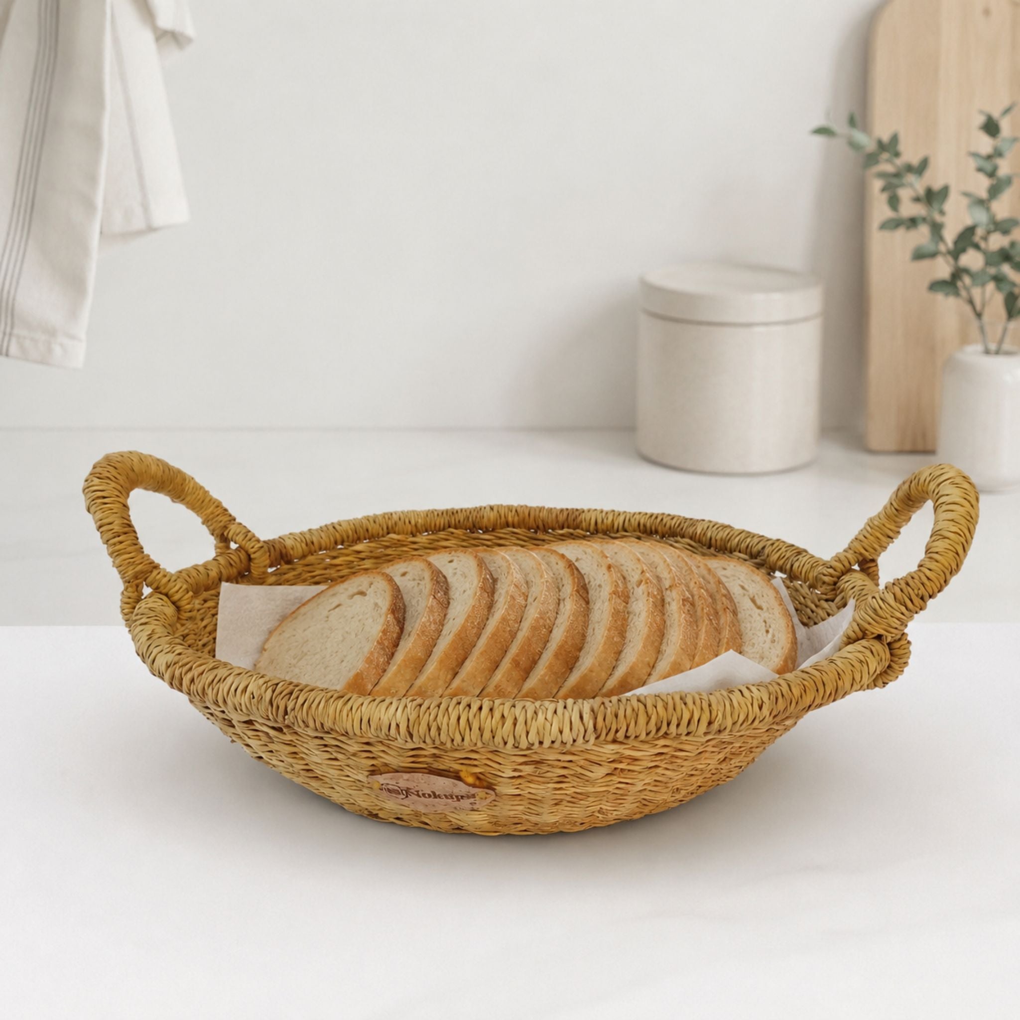 Natural boho bread basket woven elephant grass Nordic dining table decor ethical Ghana — Nokupa