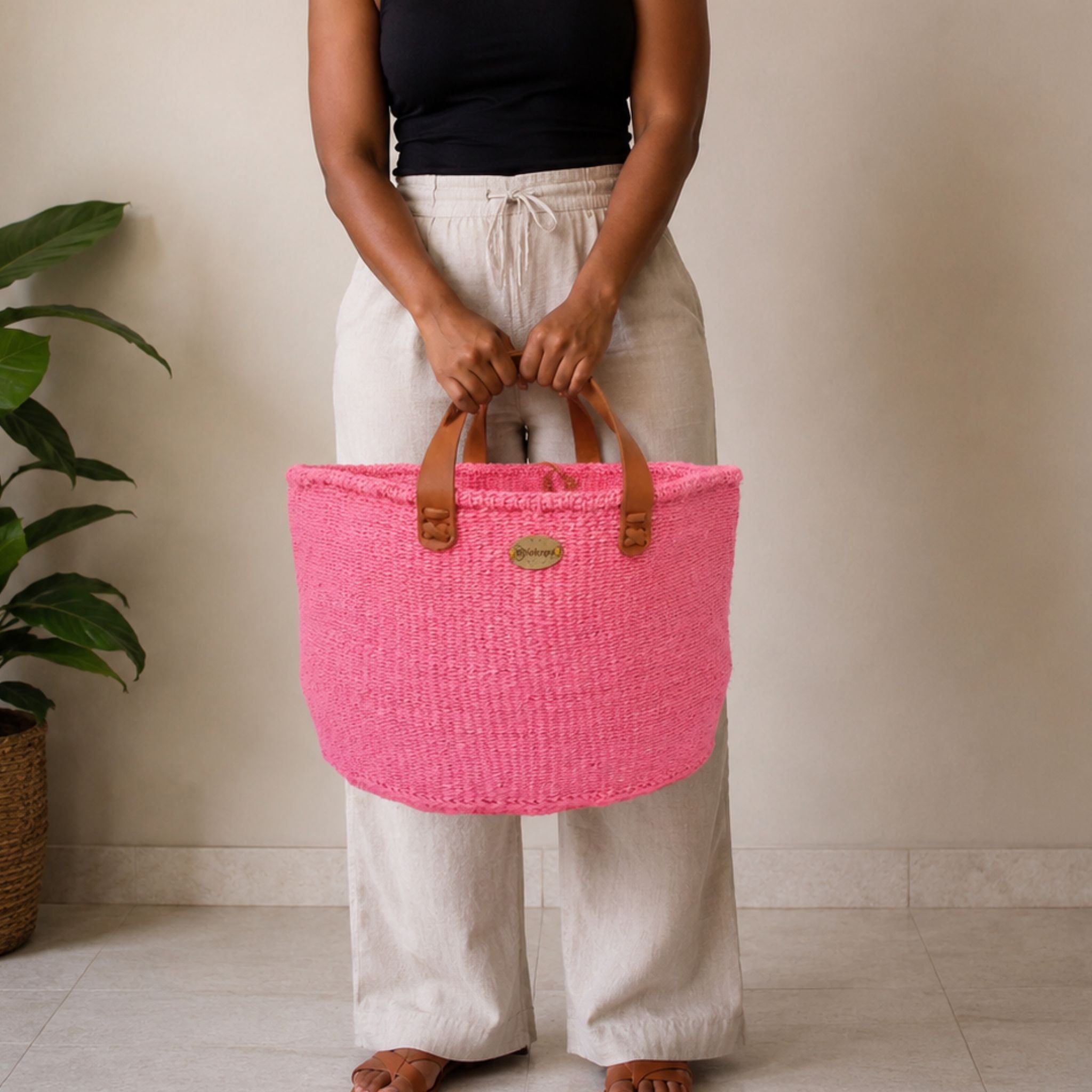 Pink sisal floor basket handwoven women artisans Kenya ethical boho sustainable — Nokupa